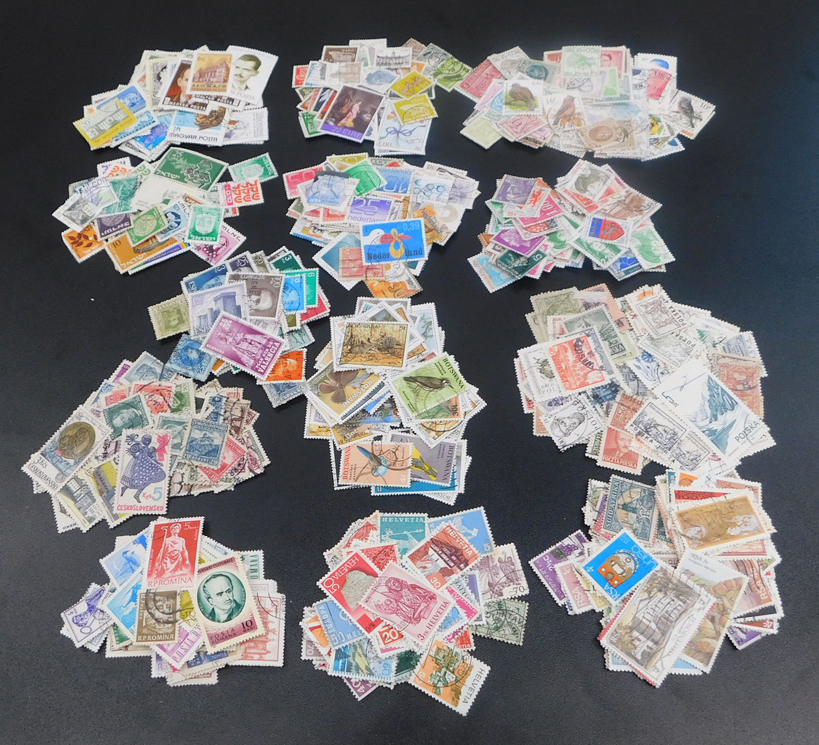 Packets of 1200 stamps in 13 packets